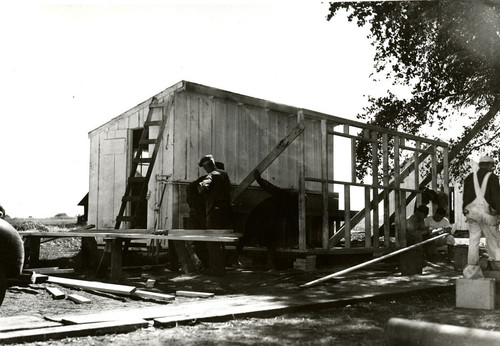 Carpenters building a camp building