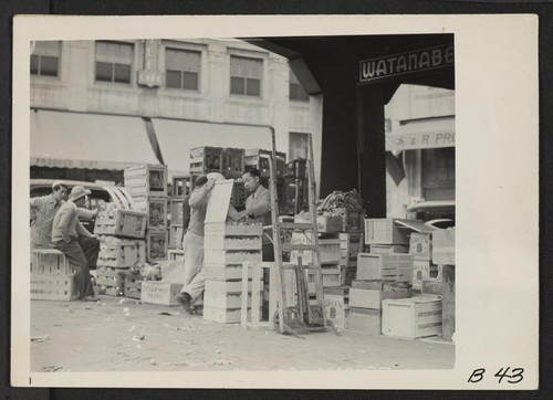 Los Angeles, Calif.--Vegetable concession in wholesale produce market, operated almost exclusively by residents of Japanese ancestry before they were evacuated. They will be transferred to War Relocation Authority centers for the duration. Photographer: Albers, Clem Los Angeles, California
